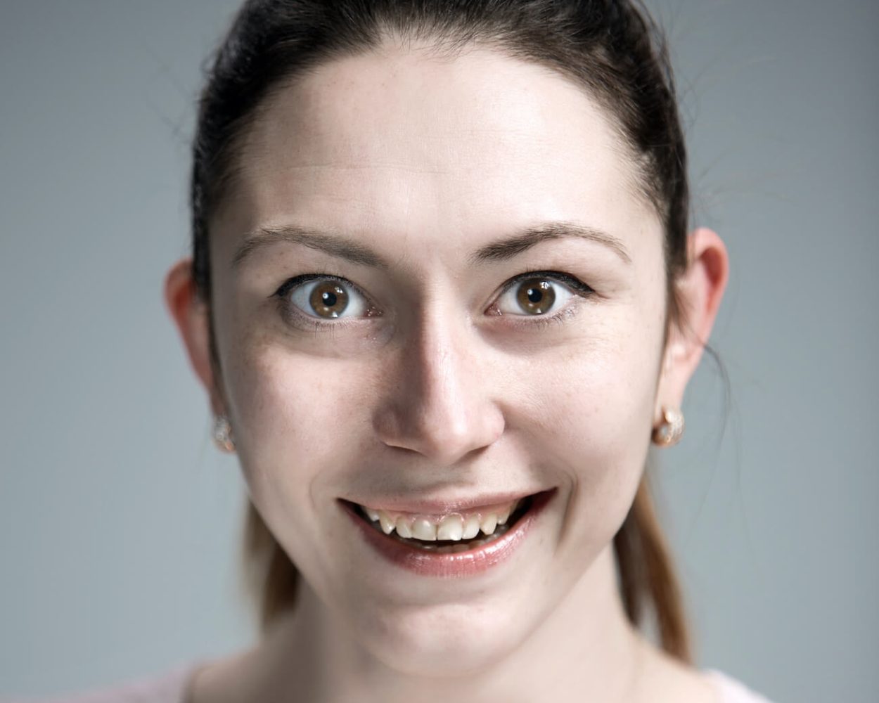 the-happy-woman-on-gray-background-2021-08-26-17-41-05-utc